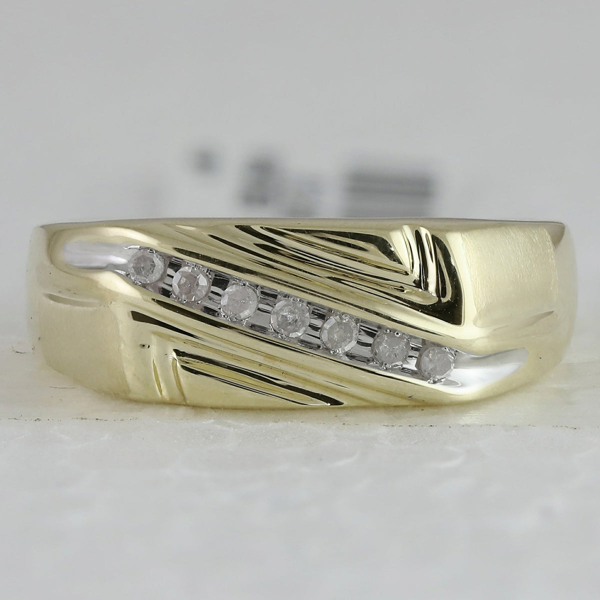 Radiant Elegance: 10kt Yellow Gold Mens Diagonal Row Diamond Wedding Band Ring - 1/8 Cttw - Splendid Jewellery