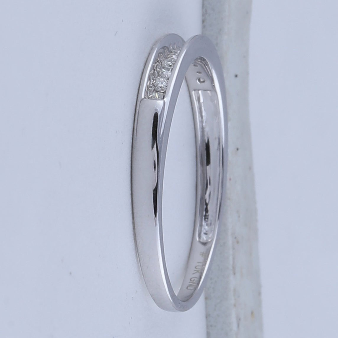 Radiant Reflections | 10kt White Gold Women's Round Diamond Single Row Band Ring 1/8 Cttw - Splendid Jewellery