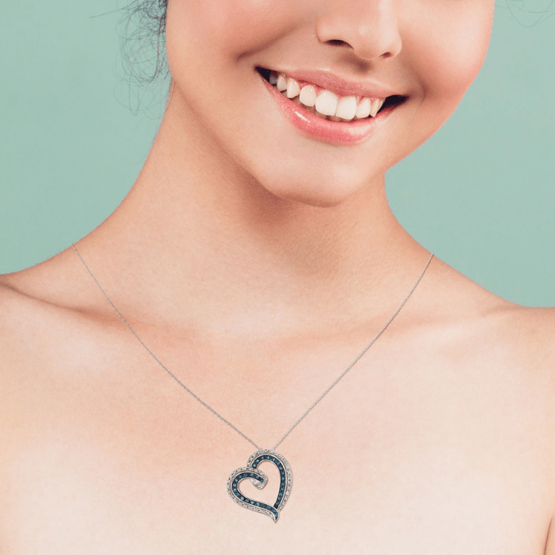 Spoil Her with White Gold Heart Pendant Embedded with Blue Color Enhanced Diamonds Splendid Jewellery