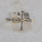 10K Yellow Gold Round Diamond Women's Cross Infinity Band Ring 1/10 Cttw - Splendid Jewellery