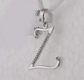 10kt White Gold Diamond Initial Z Letter Pendant: A Symbol of Uniqueness and Elegance Side view from the 10Kt White Gold Womens Round Diamond Initial Z Letter Pendant 1 12 Cttwpin282020 collection by Splendid Jewellery