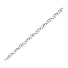 Load image into Gallery viewer, 10kt White Gold Infinity Heart Bracelet with Round Diamond Accents - 1/6 Cttw Side view from the 10Kt White Gold Womens Round Diamond Infinity Heart Bracelet 1 6 Cttwpin227803 collection by Splendid Jewellery