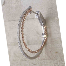 Load image into Gallery viewer, 14kt Dual-Tone Gold Diamond Accent Hoop Earrings: A Timeless Statement of Elegance - Side View