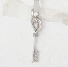 Sterling Silver Round Diamond Sterling Silver Womens Heart Key Pendant 1/8 Cttw - Splendid Jewellery