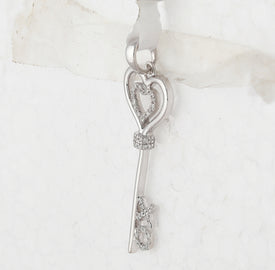 Sterling Silver Round Diamond Sterling Silver Womens Heart Key Pendant 1/8 Cttw - Splendid Jewellery