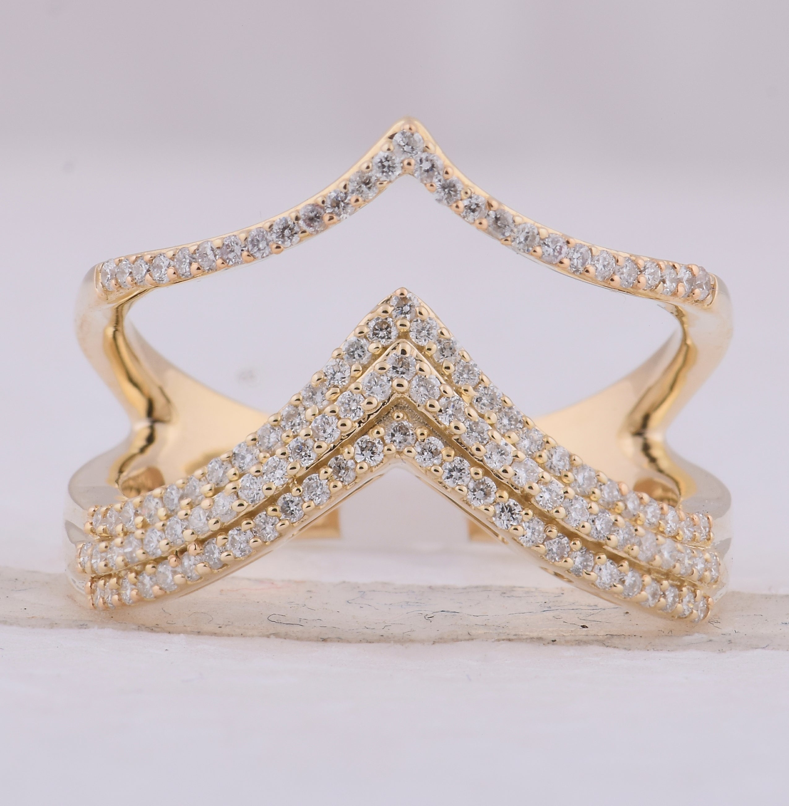 Dazzling Diamond Elegance: 10kt Yellow Gold Womens Round Diamond Chevron Band Ring 3/8 Cttw - Splendid Jewellery