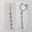 Diamond Cascade Hoop Earrings Side view from the 10Kt White Gold Womens Round Diamond Hoop Dangle Earrings 5 8 Cttwpin281709 collection by Splendid Jewellery