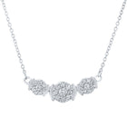 Captivating Brilliance: 10kt White Gold Triple Cluster Diamond Pendant Necklace Top view from the 10Kt White Gold Womens Round Diamond Triple Cluster Necklace 1 4 Cttwpin212264 collection by Splendid Jewellery