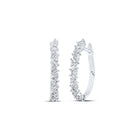 Radiant Brilliance: 10kt White Gold Baguette Diamond Hoop Earrings - Alternate view 1 from Splendid Jewellery