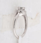 Enchanting Love's Embrace | 10kt White Gold Princess Round Diamond Cluster Bridal Wedding Engagement Ring 1/5 Cttw Top View from Splendid Jewellery