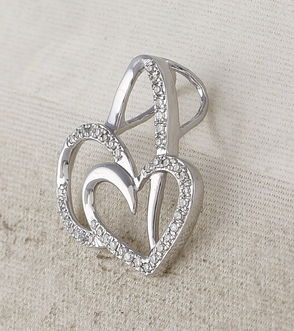 Enchanting Love's Eternal Embrace Pendant | 10kt White Gold Womens Round Diamond Heart Pendant 1/6 Cttw - Splendid Jewellery