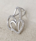 Enchanting Love's Eternal Embrace Pendant | 10kt White Gold Womens Round Diamond Heart Pendant 1/6 Cttw - Splendid Jewellery