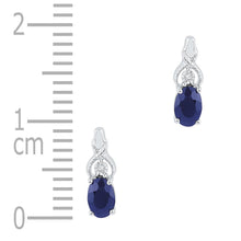 Load image into Gallery viewer, Exquisite Blue Sapphire Stud Earrings in 10kt White Gold Side view from the 10Kt White Gold Womens Oval Lab Created Blue Sapphire Stud Earrings 7 8 Cttwpin66341 collection by Splendid Jewellery