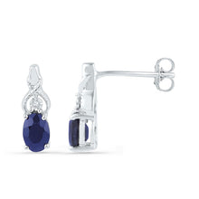 Load image into Gallery viewer, Exquisite Blue Sapphire Stud Earrings in 10kt White Gold Top view from the 10Kt White Gold Womens Oval Lab Created Blue Sapphire Stud Earrings 7 8 Cttwpin66341 collection by Splendid Jewellery