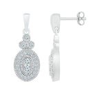 Exquisite Brilliance: 10kt White Gold Womens Round Diamond Oval Dangle Earrings - Splendid Jewellery