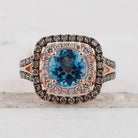 Radiant Blue Topaz Halo Ring in 14kt Rose Gold with Brown Diamonds - Splendid Jewellery