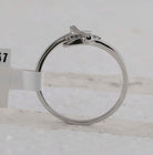 Radiant Cross of Diamonds Ring | 10kt White Gold Womens Round Diamond Cross Ring 1/12 Cttw | Splendid Jewellery Side 2 view from the 10Kt White Gold Womens Round Diamond Cross Ring 1 12 Cttwpin228243 collection by Splendid Jewellery