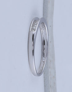 Radiant Reflections | 10kt White Gold Women's Round Diamond Single Row Band Ring 1/8 Cttw - Splendid Jewellery