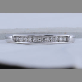 Radiant Reflections | 10kt White Gold Women's Round Diamond Single Row Band Ring 1/8 Cttw - Splendid Jewellery