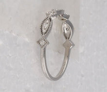 Load image into Gallery viewer, Sparkling White Gold Diamond Stackable Band Ring - Elegant and Versatile Jewelry Piece Side view from the 10Kt White Gold Womens Round Diamond Stackable Band Ring 1 8 Cttwpin280508 collection by Splendid Jewellery