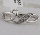 Sterling Silver Round Diamond Twist Fashion Band Ring . 0.03 Cttw - Splendid Jewellery