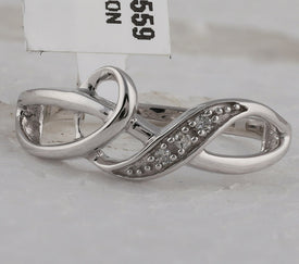 Sterling Silver Round Diamond Twist Fashion Band Ring . 0.03 Cttw - Splendid Jewellery