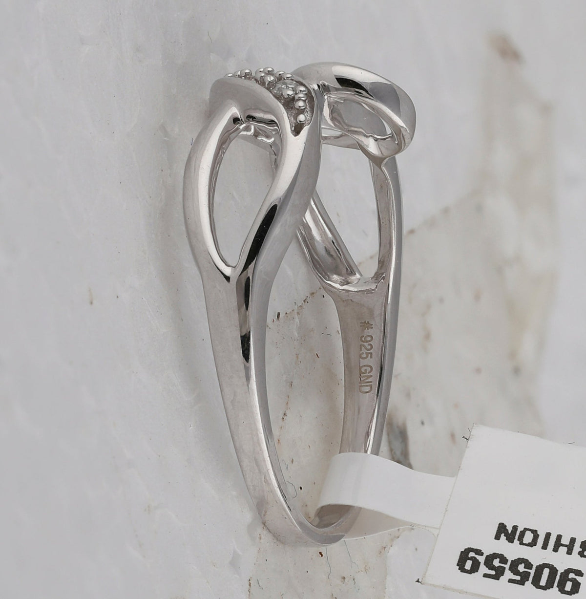 Sterling Silver Round Diamond Twist Fashion Band Ring . 0.03 Cttw - Splendid Jewellery