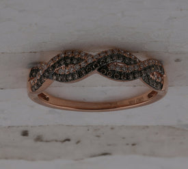 Twist of Elegance: 10kt Rose Gold Brown Diamond Twist Band Ring - Alternate view 1 from Splendid Jewellery
