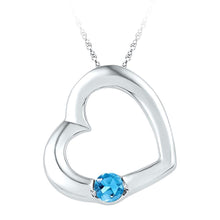 Load image into Gallery viewer, 10kt White Gold Heart Pendant with Lab-Created Blue Topaz: A Timeless Symbol of Love and Affection  Top View from Splendid Jewellery