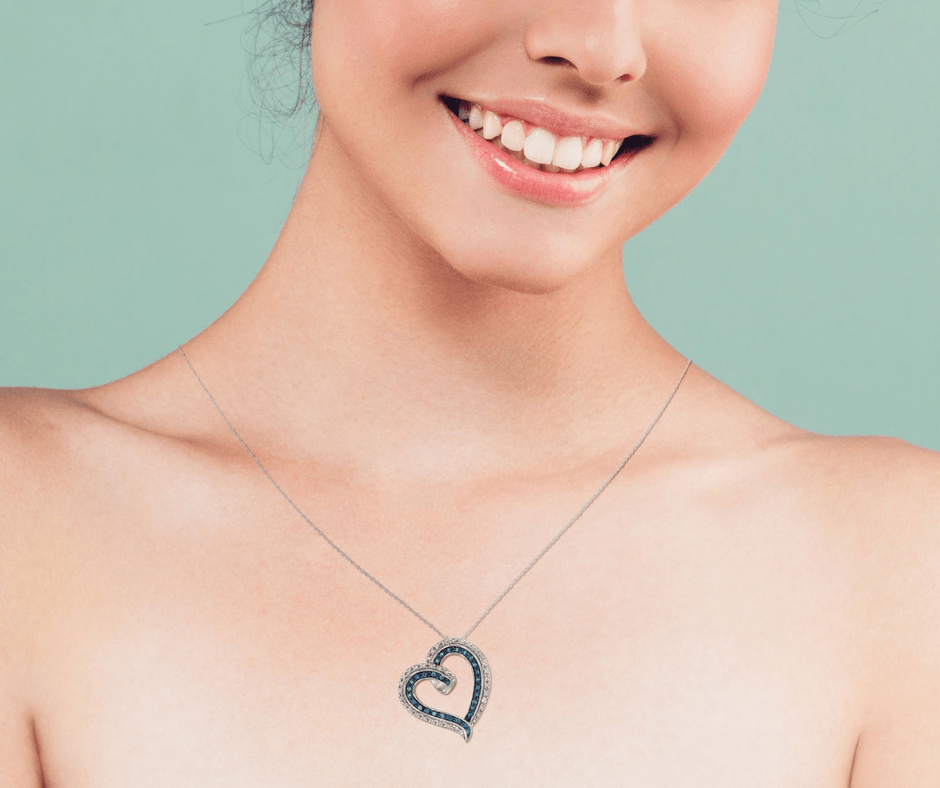 Spoil Her with White Gold Heart Pendant Embedded with Blue Color Enhanced Diamonds Splendid Jewellery